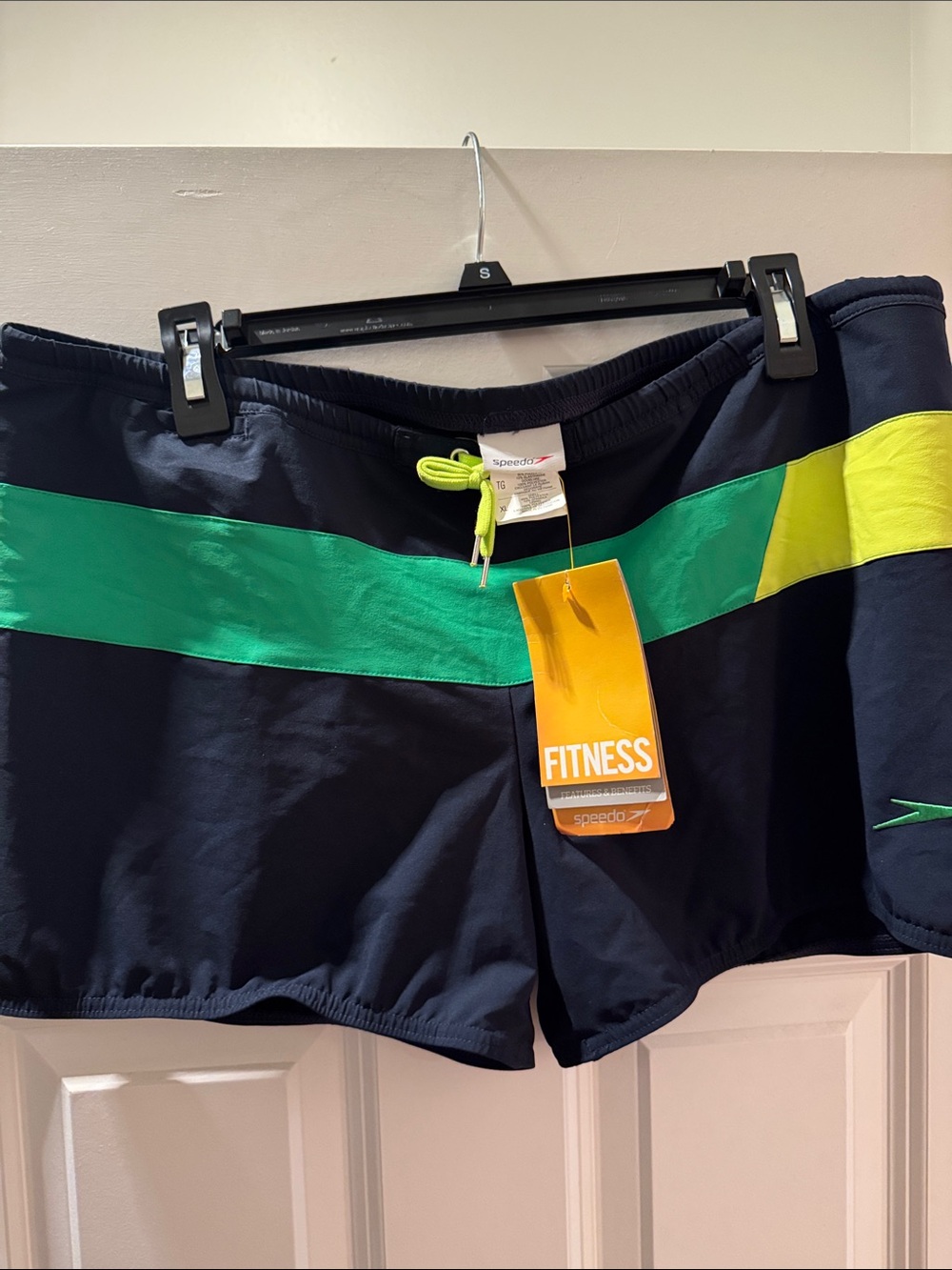 Speedo Navy Swim Trunks with Green and Yellow Accents.